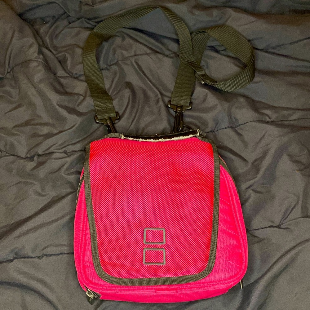 STRAPPED POUCH BAG